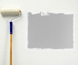 Painter roll infront of  ingrain wallpaper